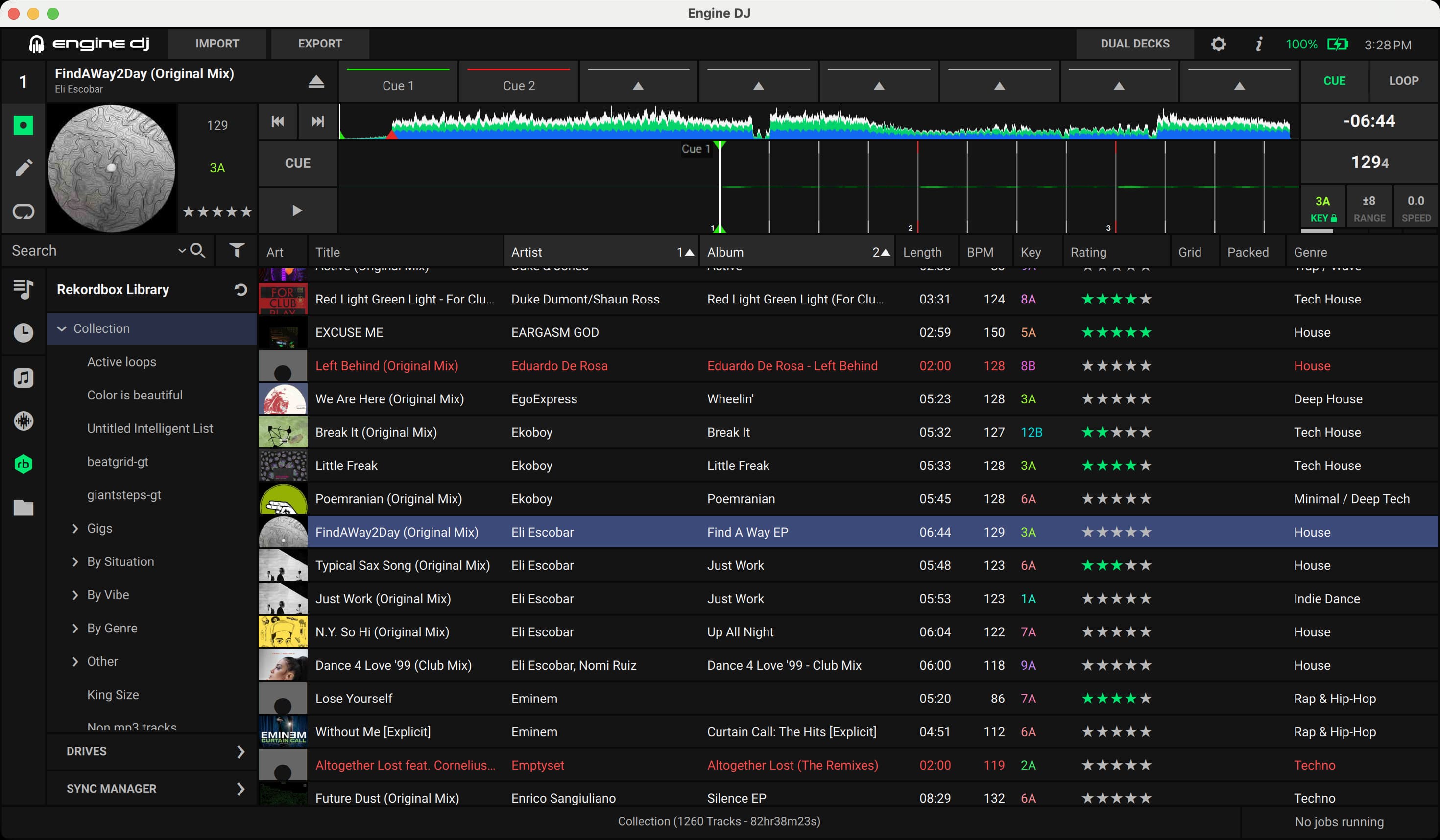 Engine DJ desktop library with a Rekordbox collection, track browser, waveform, cues, BPM, key, ratings, and genre