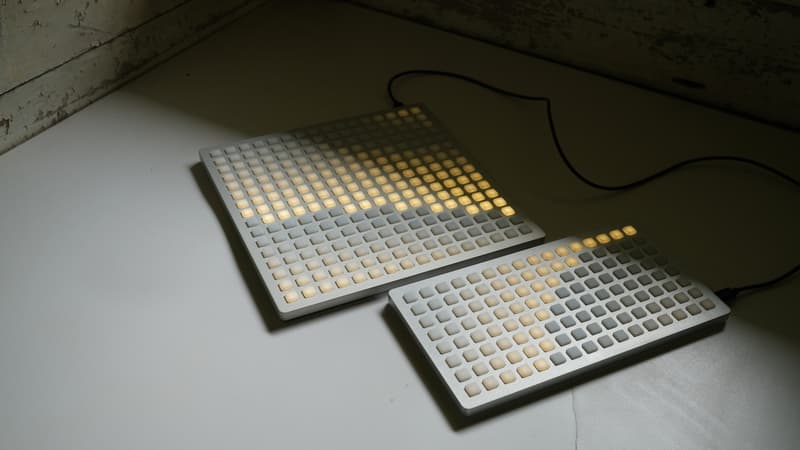 Monome Grid with warm white backlit buttons
